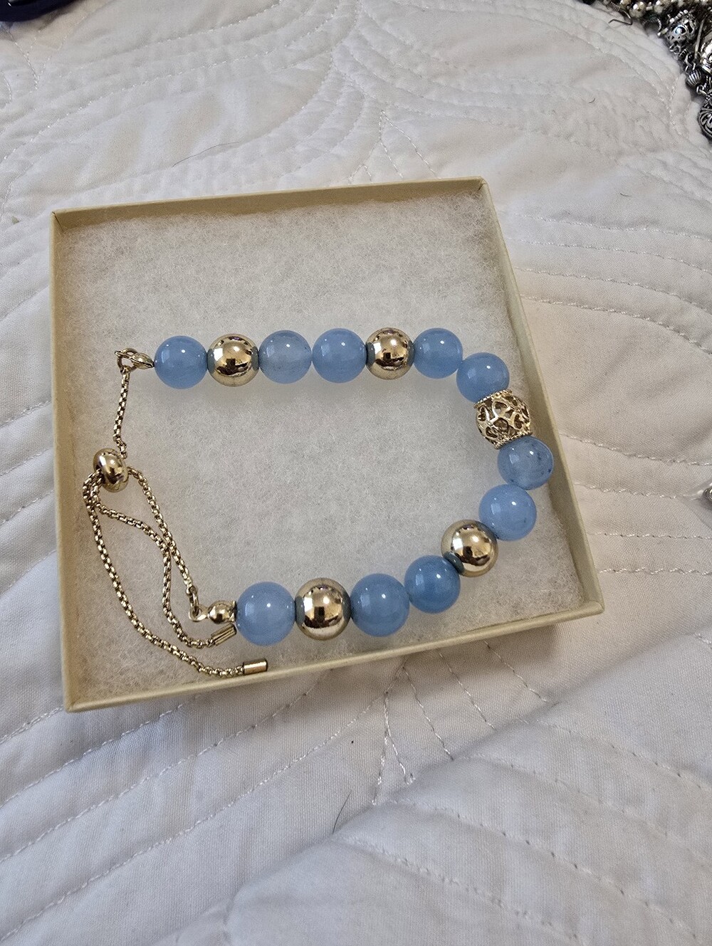 Beautiful Adjustable Blue Beaded Bracelet with Gold Accents